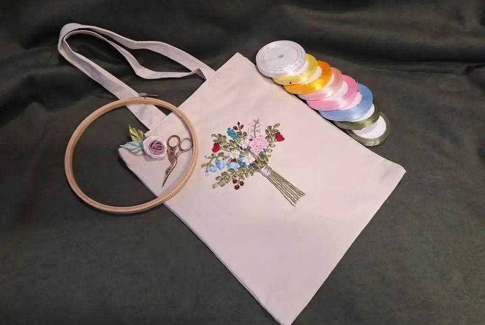 Embroidery with me-tape embroidering.